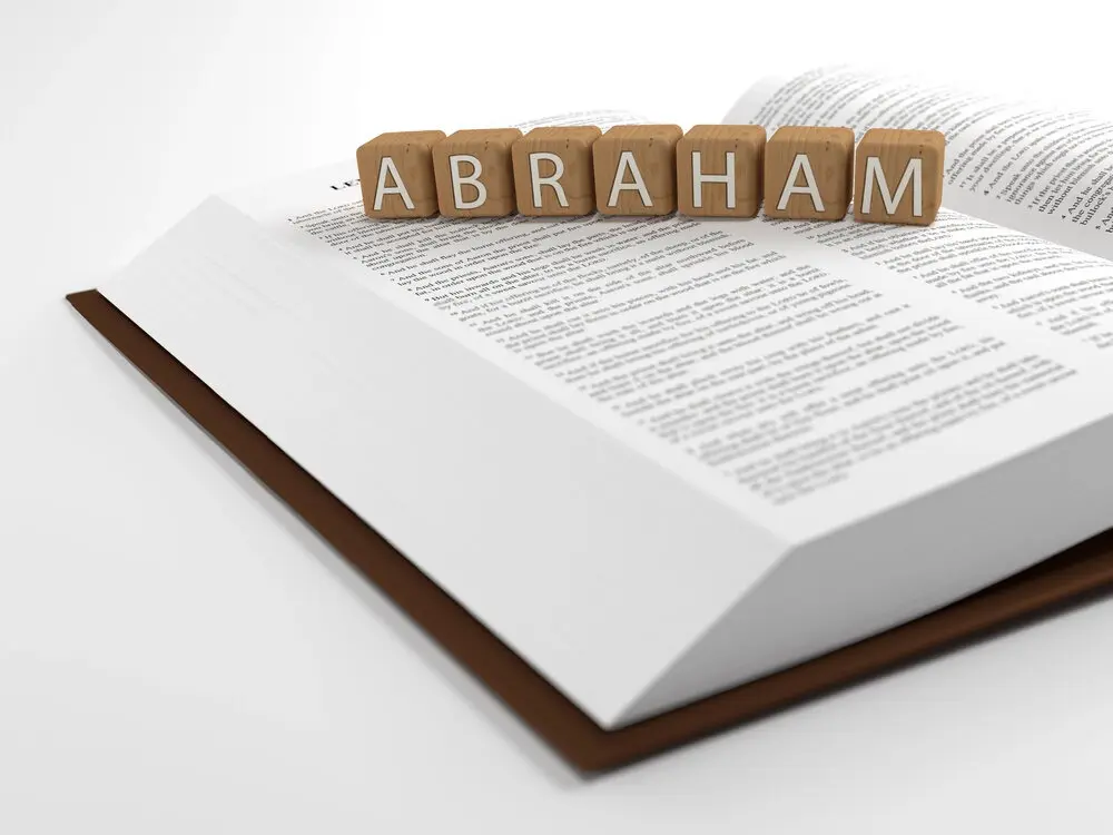 Open Bible with "Abraham" spelled out in blocks setting on it; A is for Abraham