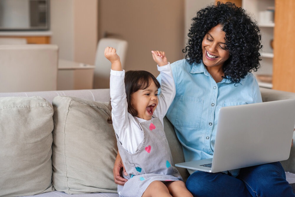 little girl celebrating, cheering, boasting her success